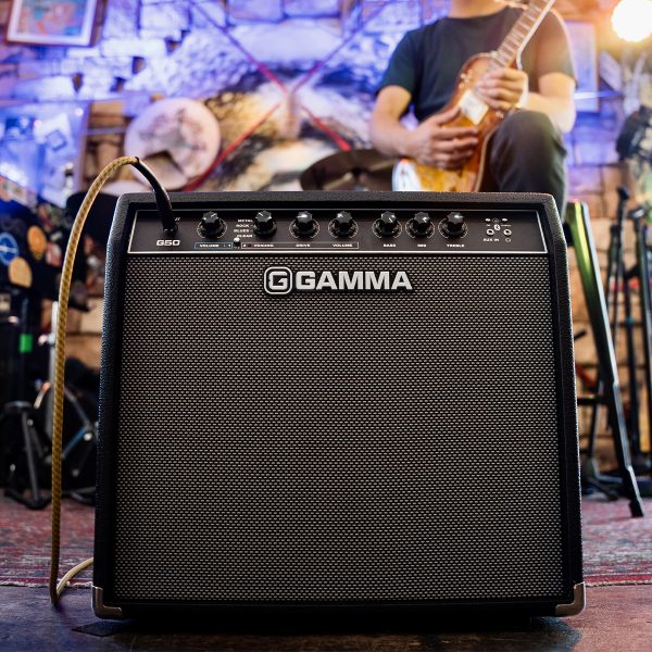 man playing electric guitar with a GAMMA G50 Guitar Amplifier in the foreground