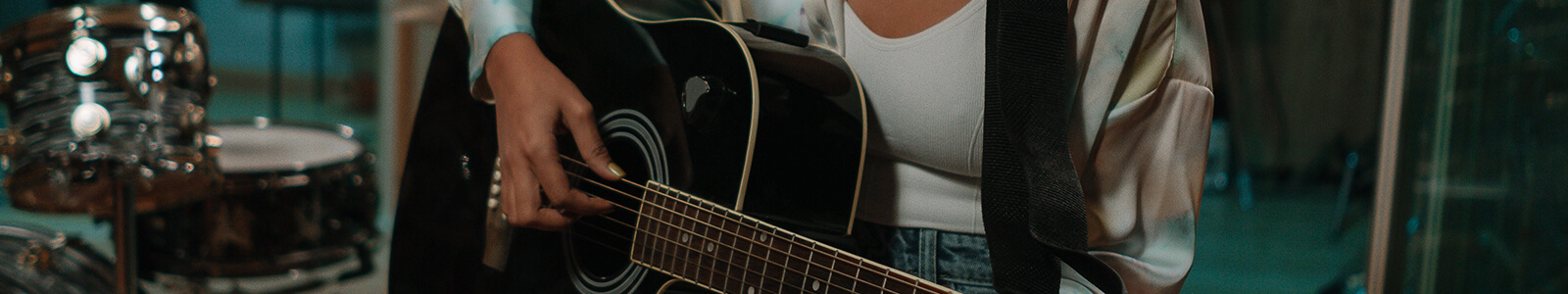 acoustic guitar player performing