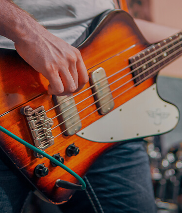 bass player playing bass guitar